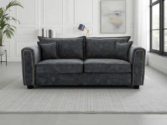 Serena 3 Seater Sofa: Plush Fabric, Quilted Sides, Metal Trim