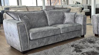 Serena Grey 3 Seater Sofa: Plush Fabric, Quilted Sides, Metal Trim