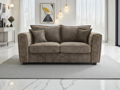 Serena 2 Seater Sofa: Modern Quilted Design, Chic Metal Trim Accents